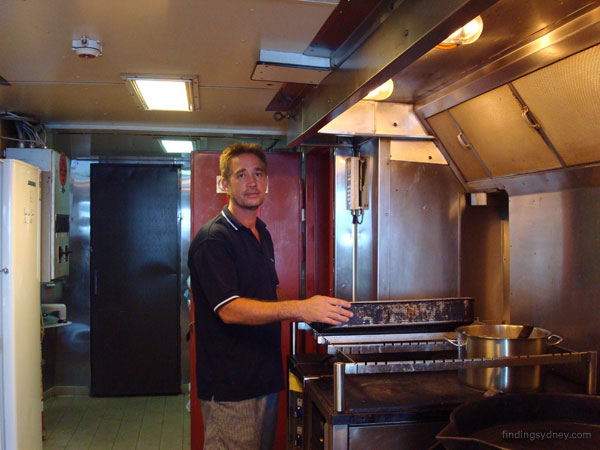 Peter, the Geosounder cook, standing in his galley.